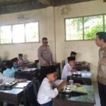 Polsek Lembar Pastikan Program Makan Bergizi Gratis Berjalan Aman dan Lancar